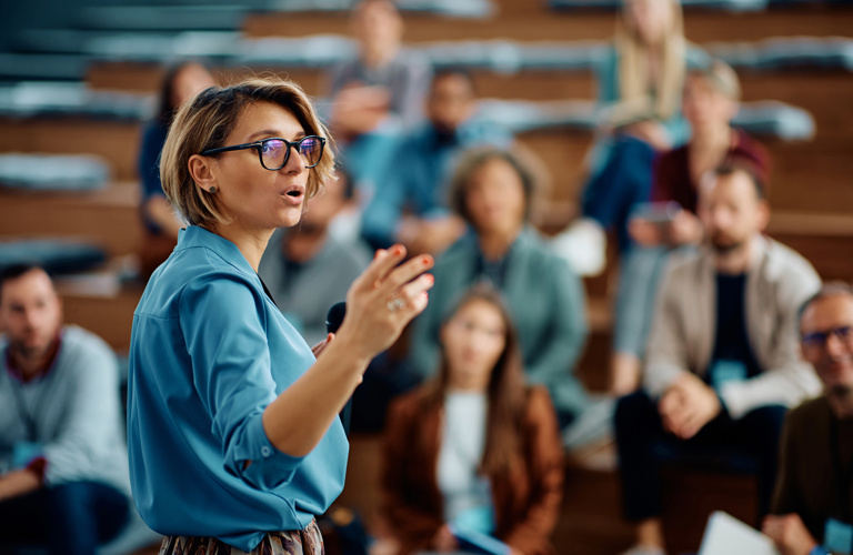 Female speaker discussing new loan administration system and digital transformation with Lenvi