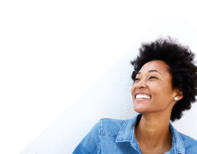 Person looking upward against a clean background, representing growth and forward-thinking lending